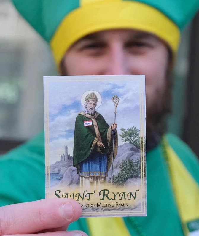 St. Ryan handing out greeting cards
